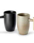 Slender and graceful ceramic mug with beech wood handle in two colour options