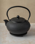 1.5 litre black cast iron teapot with hobnail design, stainless steel mesh filter, by The Tea House