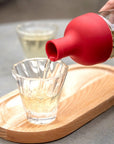 Filter-in-bottle for cold brew loose leaf tea, 750 ml with integrated filter and silicone lid.