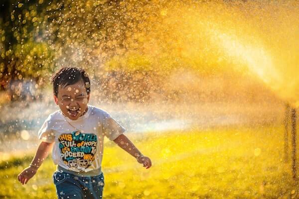 Happy boy running