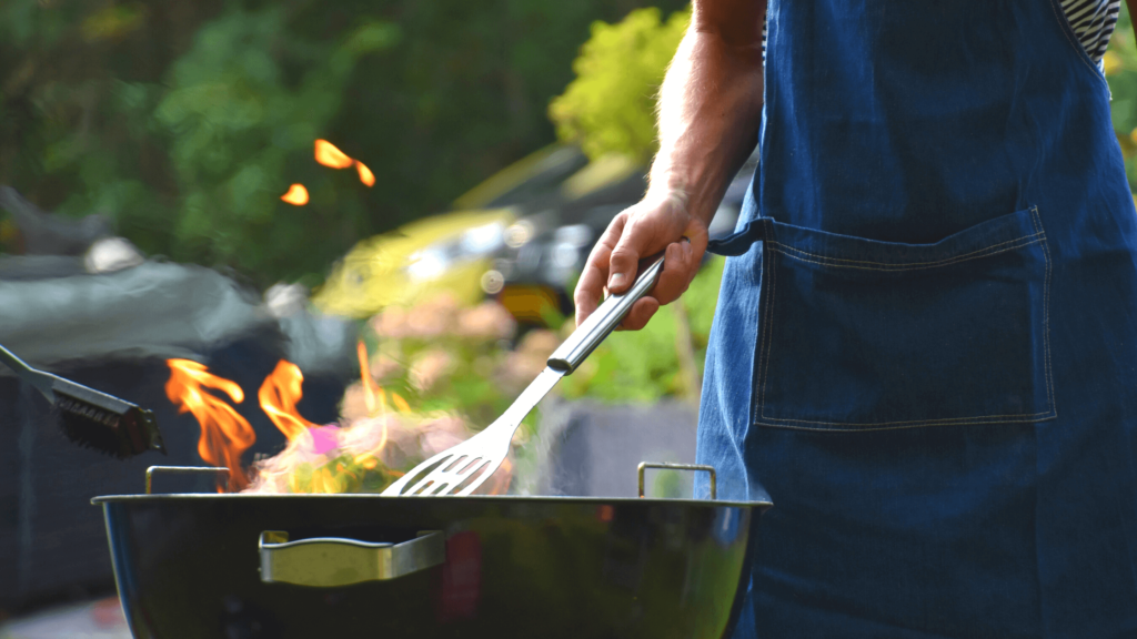 Man using a BBQ