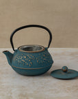 800ml blue cast iron teapot with gold design and stainless steel filter basket, by The Tea House