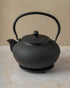 1.5 litre black cast iron teapot with hobnail design, stainless steel mesh filter, by The Tea House
