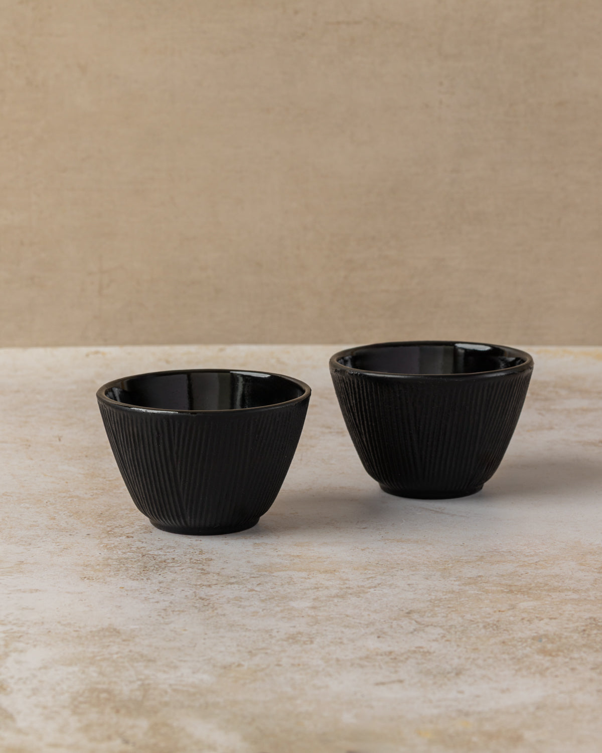 110ml black enamel lined cast iron tea cup with stripe design, by The Tea House