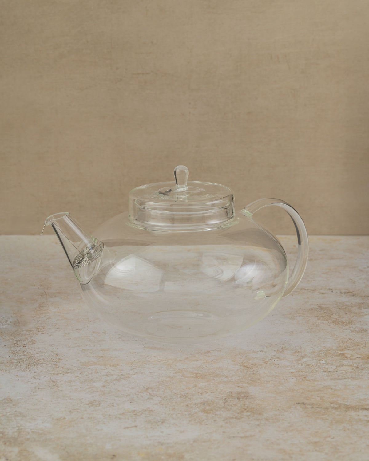 Clear borosilicate glass teapot with inbuilt stainless steel spout sieve capacity 1.4lt 