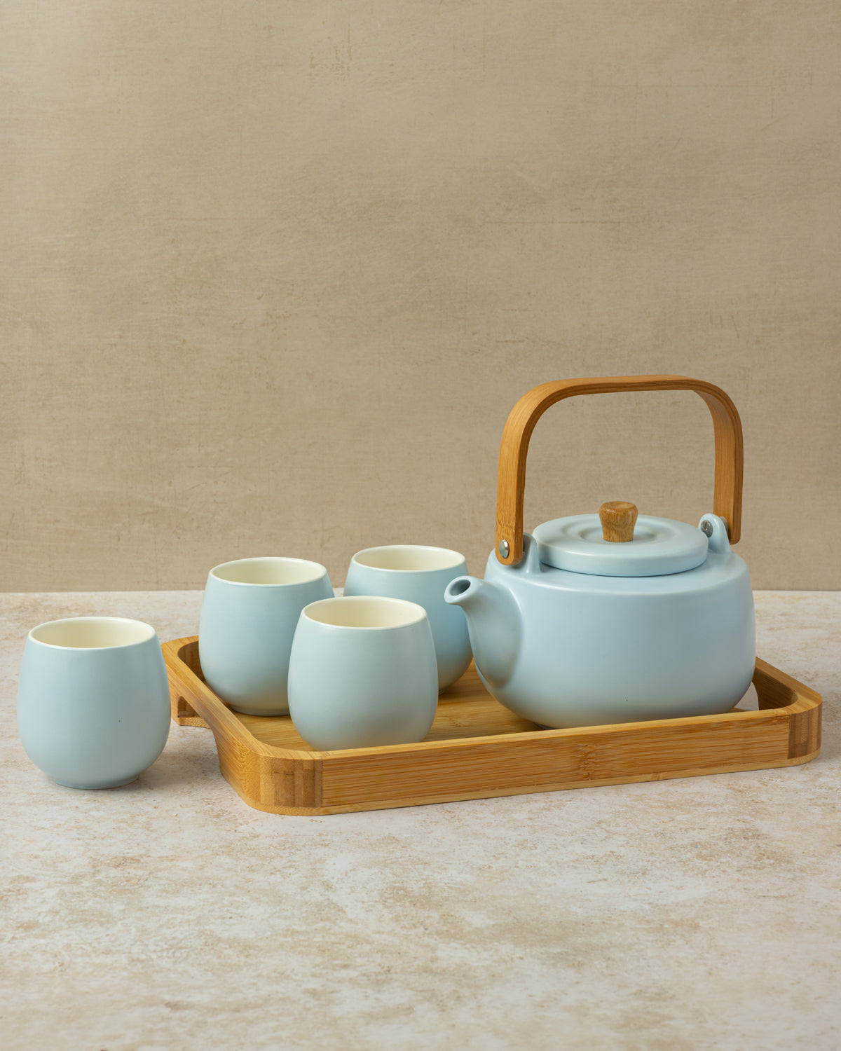 Pale blue porcelain four cup tea set with wooden handle teapot and bamboo tray