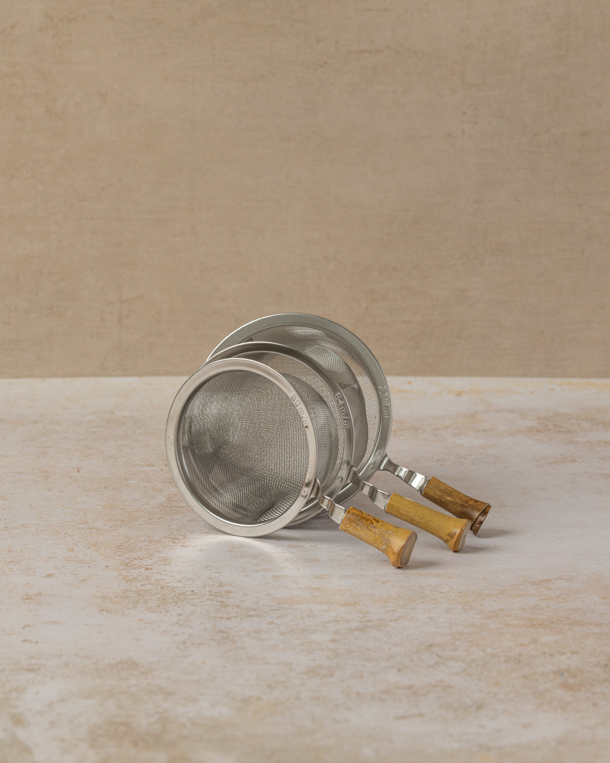 Fine mesh tea infuser sieve with bamboo handle available in three sizes, by The Tea House