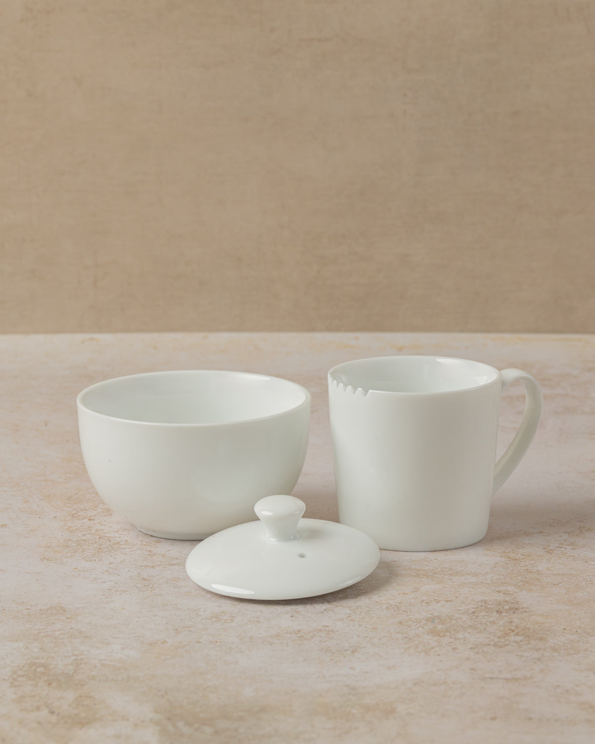 Three piece tea cupping set in white ceramic includes cup, lid and bowl, by The Tea House