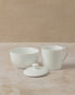 Three piece tea cupping set in white ceramic includes cup, lid and bowl, by The Tea House