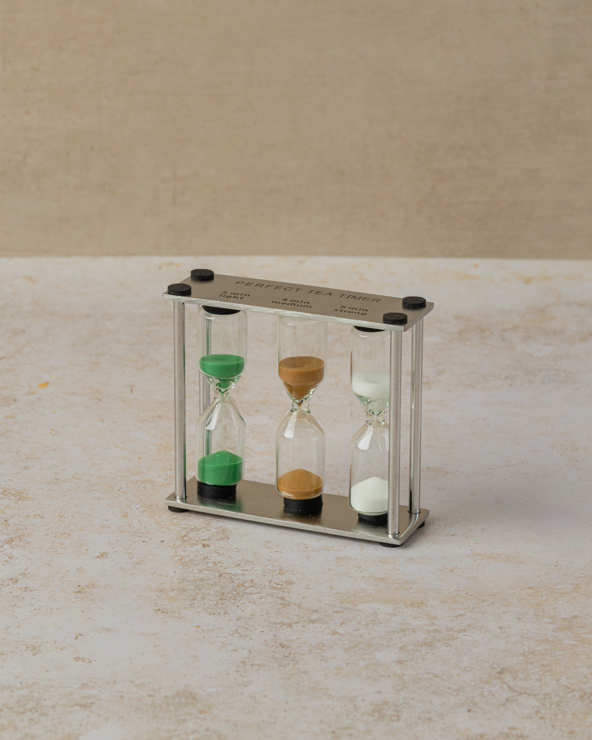 Hourglass style sand filled tea timer with three settings, by The Tea House