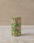 Cylindrical tea caddy with pink and white cherry blossom design on green background 