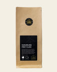 100g pack of black tea, entitled Darjeeling First Flush, by The Tea House